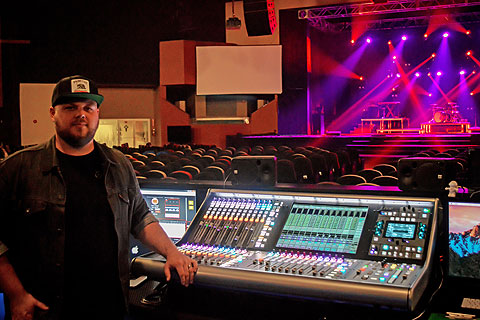 Technical director and FOH engineer Tyler DeYoung with the SSL L500 at FOH in the main auditorium