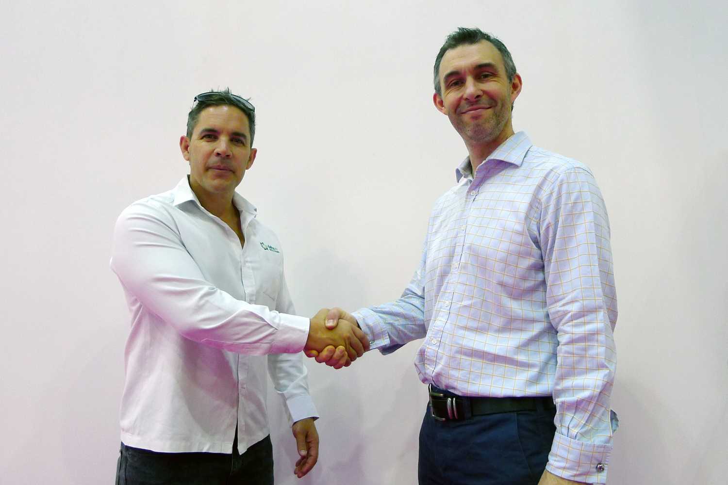 Delta AV Solutions’ Gareth Armstrong (left) seals the deal with Martin Audio’s Bradley Watson
