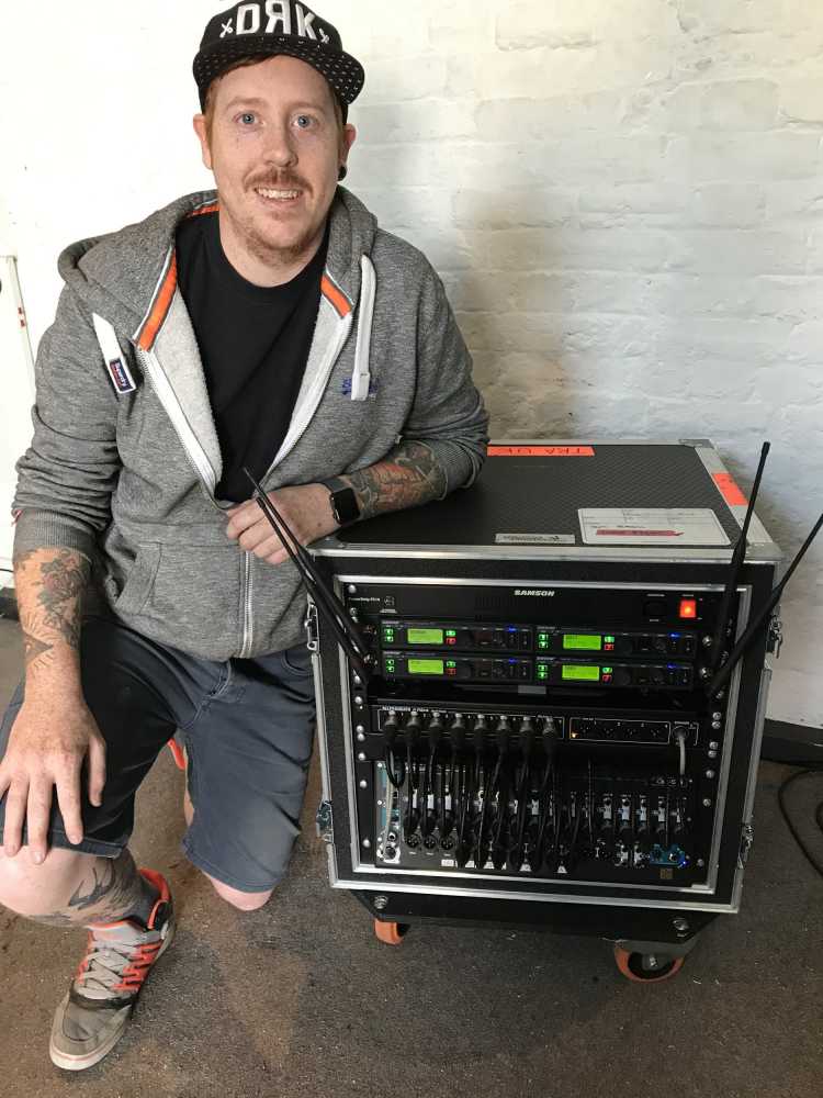 The Raven Age bass player Matt Cox with the band’s Qu-SB digital mixer and AR84 AudioRack