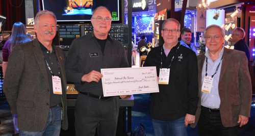 ETC CEO Fred Foster (second from left) with members of the Behind the Scenes Board of Directors, Eddie Raymond, Rick Rudolph (chair) and Jules Lauve