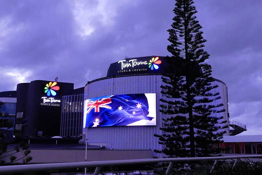 The exterior of the Twin Towns Club’s main building has been transformed into a huge digital canvas