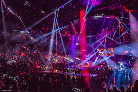 The massive, in-the-round set is composed of multiple stages spanning the arena space