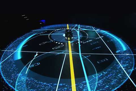 The mapped projection interacted with the car as it drove around the stage