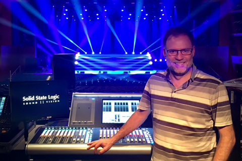 FOH engineer Simon Thomas with his SSL L200 live console