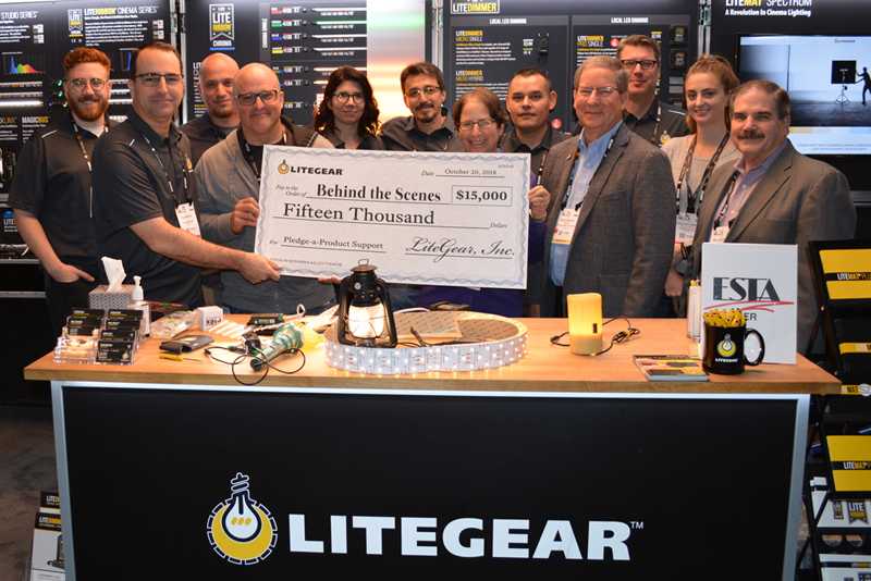 LiteGear owners Al DeMayo and Mike Bauman and their staff present a cheque to Behind the Scenes Board members Bill Groener, Rick Rudolph and Lori Rubinstein