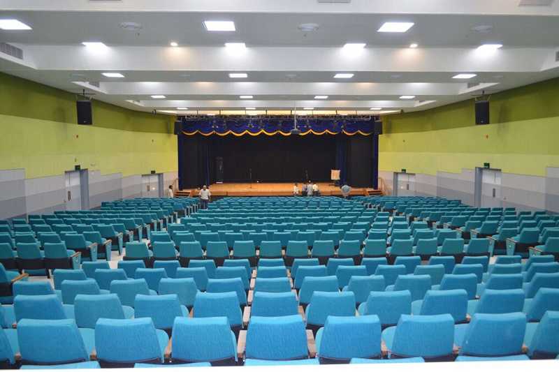The auditorium houses 900 seats and is used for various student activities and cultural programmes