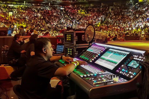 Jose Ramon Quintero, FOH engineer for Intocable, with his SSL L300