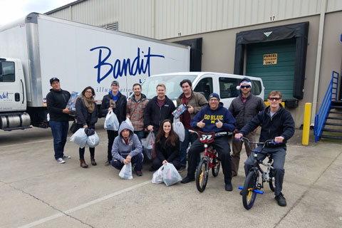 Bandit Lites, team members come together to serve their communities and children in need