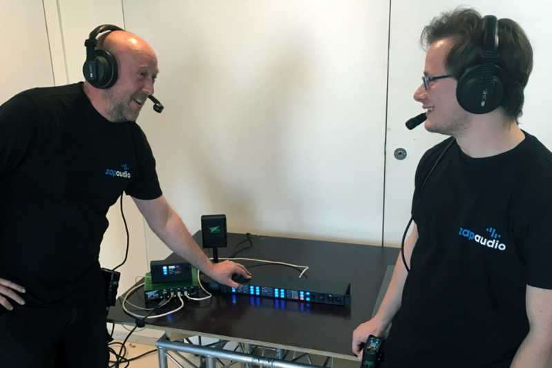 ZAP Audio's Tibor Naef and Brian d'Epagnier with a Green-GO intercom system