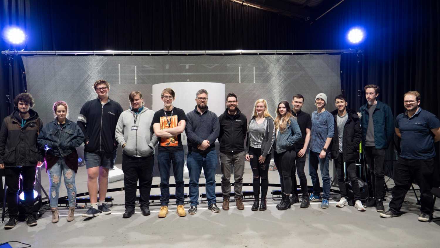 Lanz Short and Graham Thorne line up with Backstage Academy students