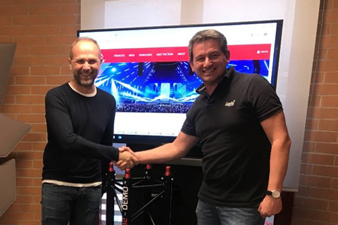 Audiosales' Stefano Rocchi and Date Jonkman of Sixty82 shake on the deal