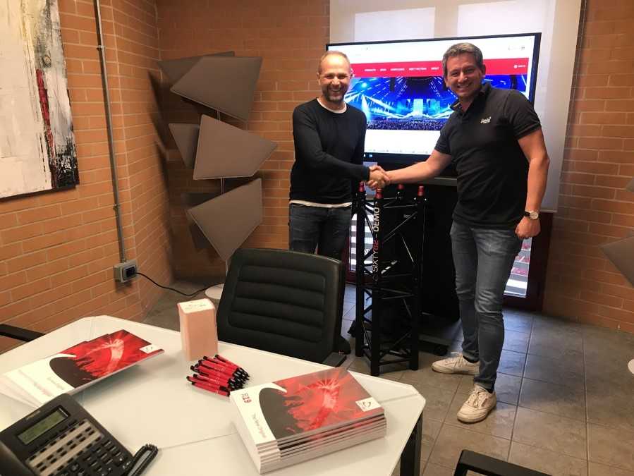 Audiosales' Stefano Rocchi and Date Jonkman of Sixty82 shake on the deal