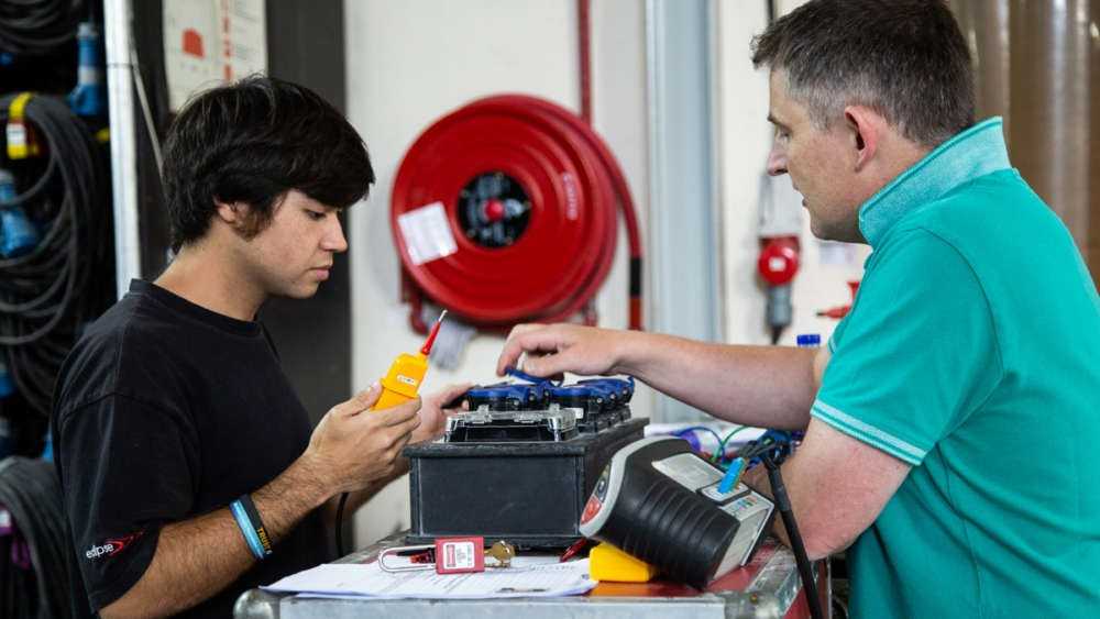 James Eade (right) teaching an electrical safety course © E-Mech Ltd.