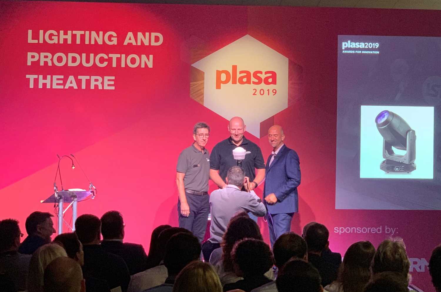 Elation product manager Matthias Hinrichs accepts the 2019 PLASA Award for Innovation