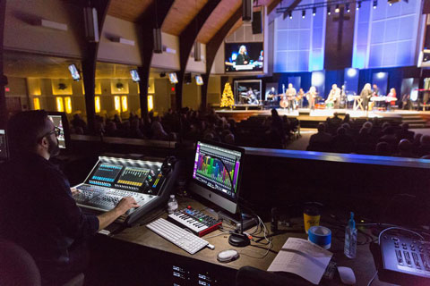 Minister of production Chris Olson running FOH and monitor mixes