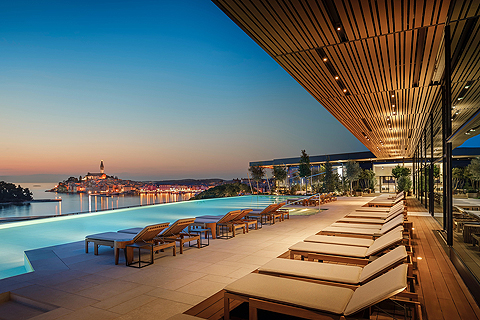 The five-star Grand Park Hotel Rovinj is set at the edge of a pine forest on the Adriatic coast