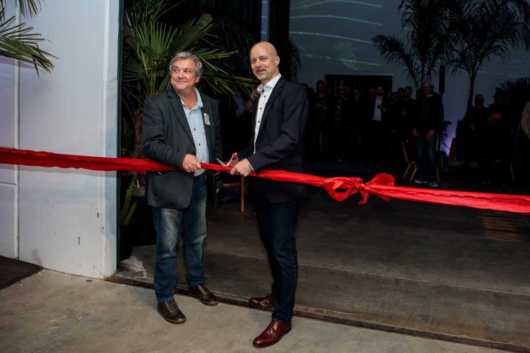 Larry Italia, president/CEO of d&b audiotechnik Americas and Amnon Harman, d&b CEO, take part in the ribbon-cutting ceremony