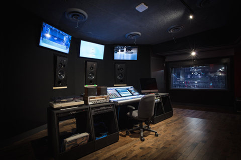 The control room is equipped with a Solid State Logic Live L550 digital mixing console