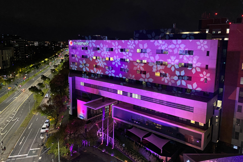 The brief was to illuminate the façade of the hospital with colour and messages of love and support