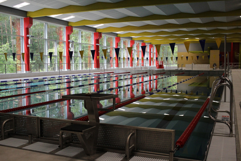 The complex includes a large swimming pool