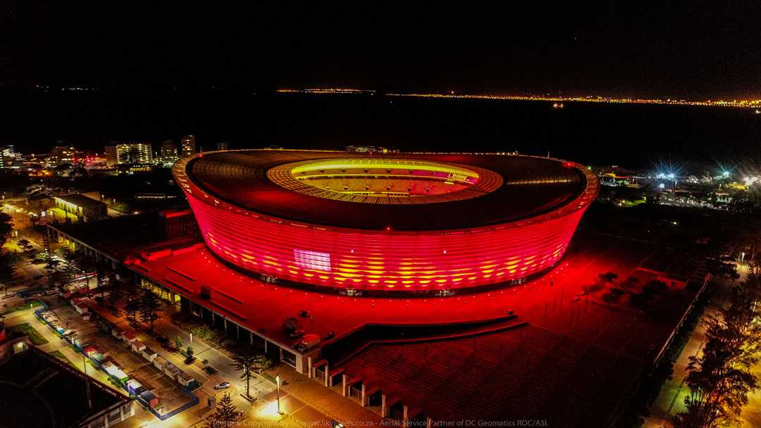 Cape Town Stadium lit in red