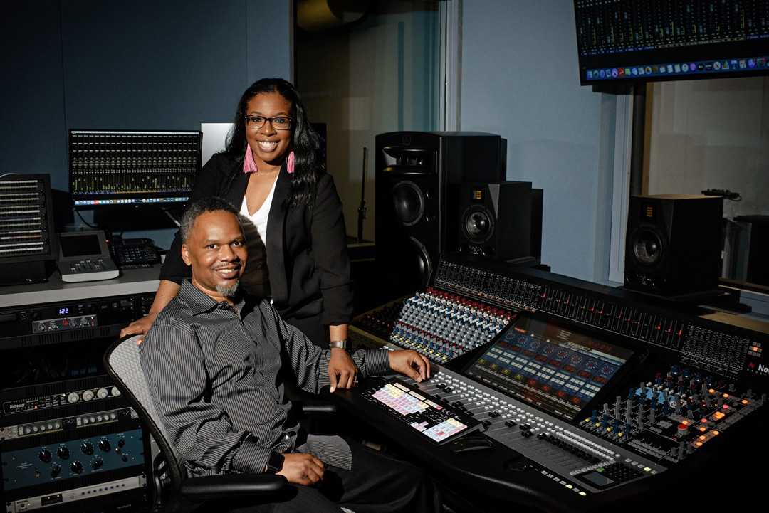 Robin and Mike Kinnie with their Neve Genesys Black console