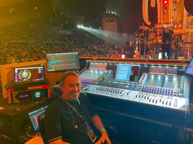 Ricky Martin’s monitor engineer, César Benítez, seated at his DiGiCo Quantum5 console
