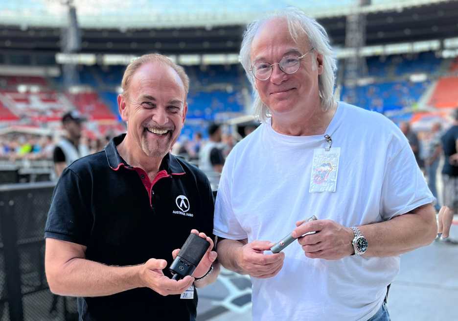 Martin Seidl, CEO of Austrian Audio, holding a OC18, with David Natale, FOH engineer for The Rolling Stones