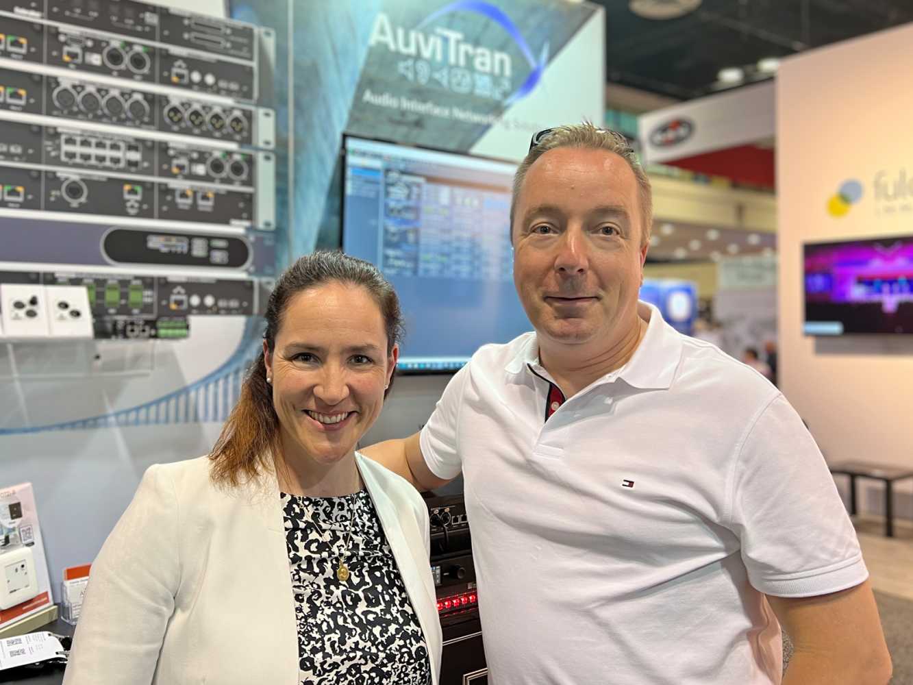 Cianna David-Kivlehan of Auvitran and Stuart Thomson of CUK on the Auvitran Booth at InfoComm
