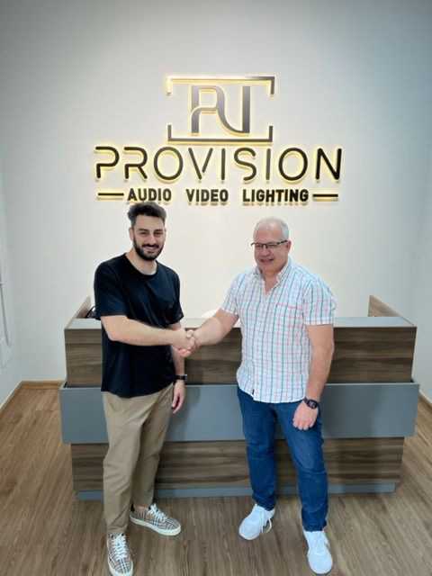 Provision AVL’s Kevin Boujikian and GLP’s Stefan Wagner shake on the new distribution deal (Photo: Provision AVL)