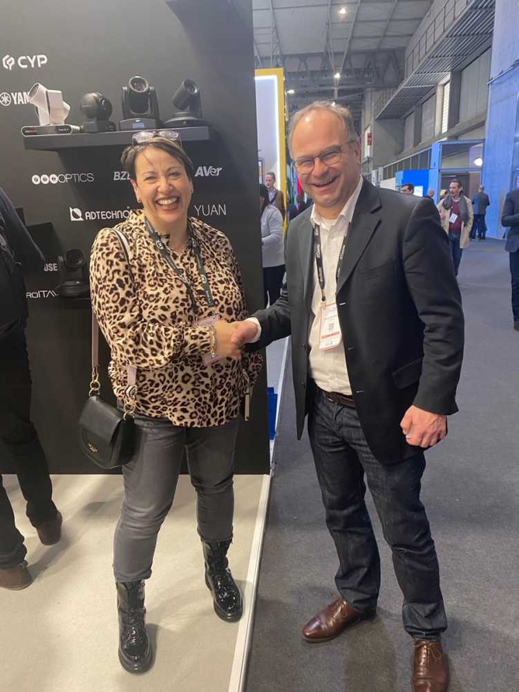 Dante AVIO Adapters are available now from Sound Technology. Alison Charters (Sound Technology) and Jochen Wainwright (Audinate) shake on the deal.